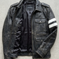 Authentic Jackero premium black leather cafe racer jacket captured against a solid grey studio backdrop for high-end e-commerce presentation.