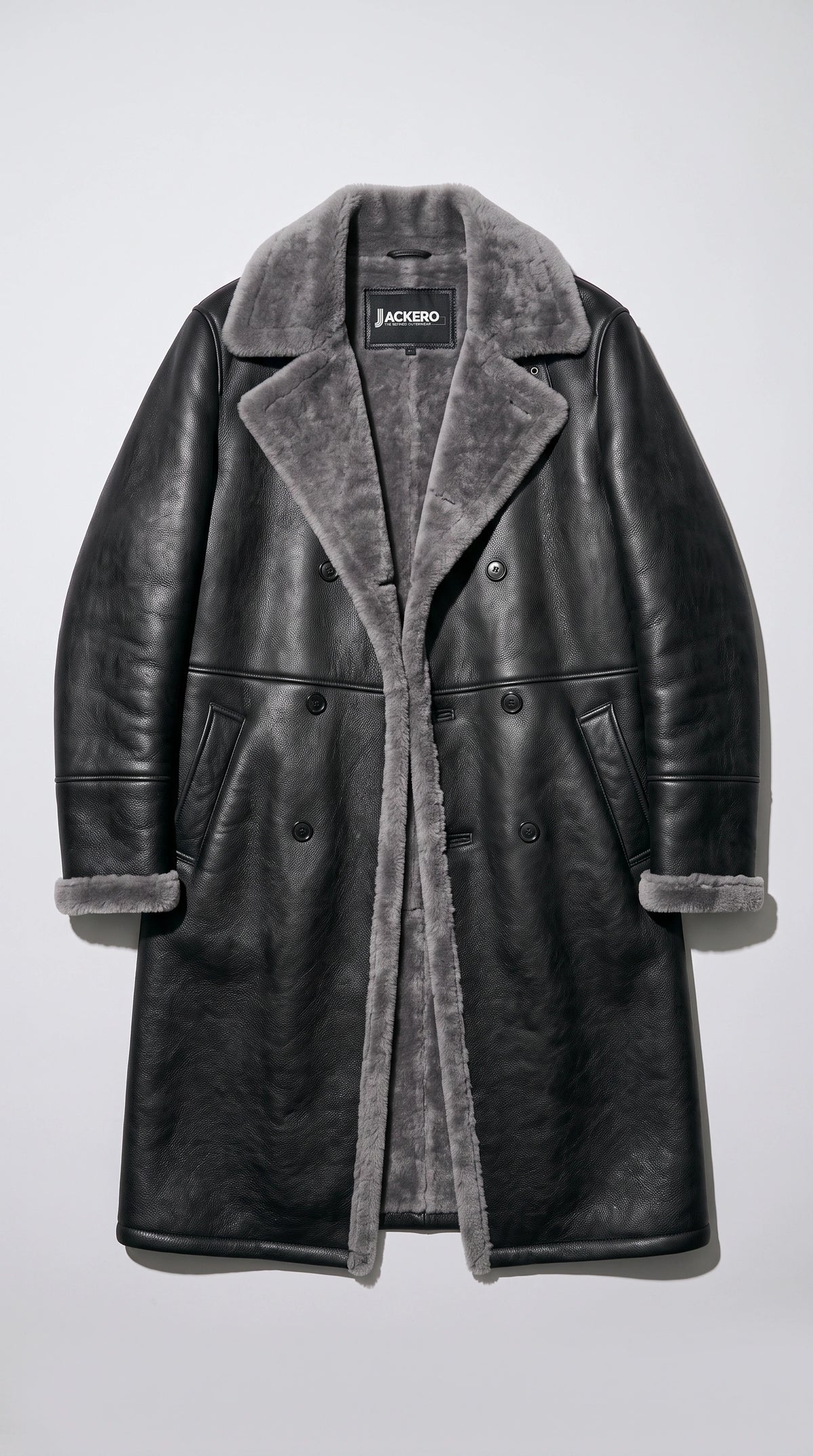 Heavy layering game with the exclusive Jackero dark graphite leather outerwear, a shearling-lined engaging streetwear staple designed to push the boundaries of contemporary urban fashion.