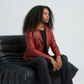Bold statement fashion lifestyle concept featuring an edgy red leather asymmetric biker jacket for a rugged streetwear look.