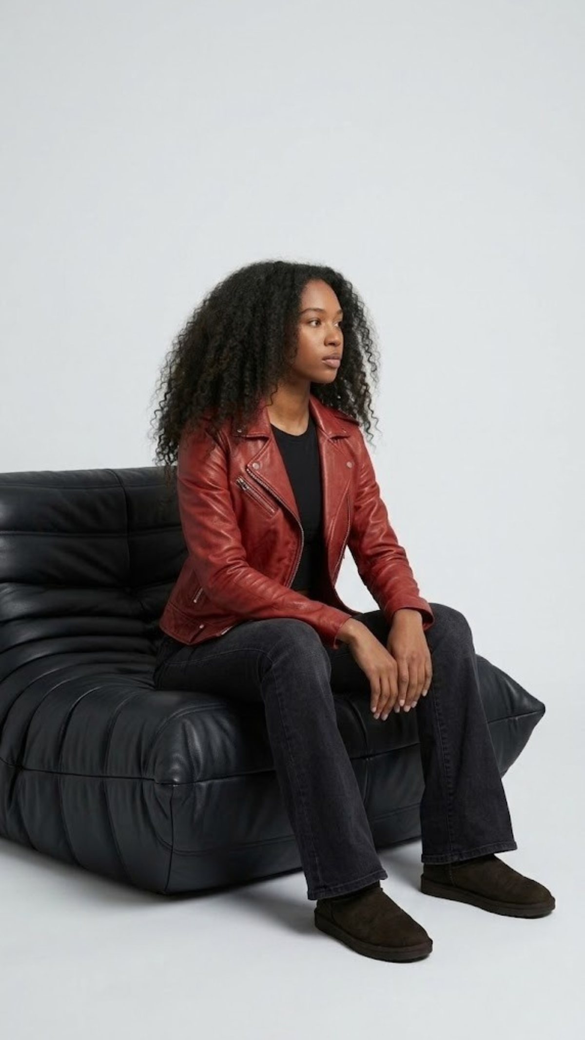 Bold statement fashion lifestyle concept featuring an edgy red leather asymmetric biker jacket for a rugged streetwear look.