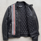 Jackero dark black striped leather jacket displayed elegantly against a clean studio backdrop.