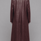 Rear view of men dark red long leather duster showing back vent slit and tailored stitching details