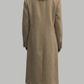 Full-length shot showcasing the classic silhouette long camel wool coat.