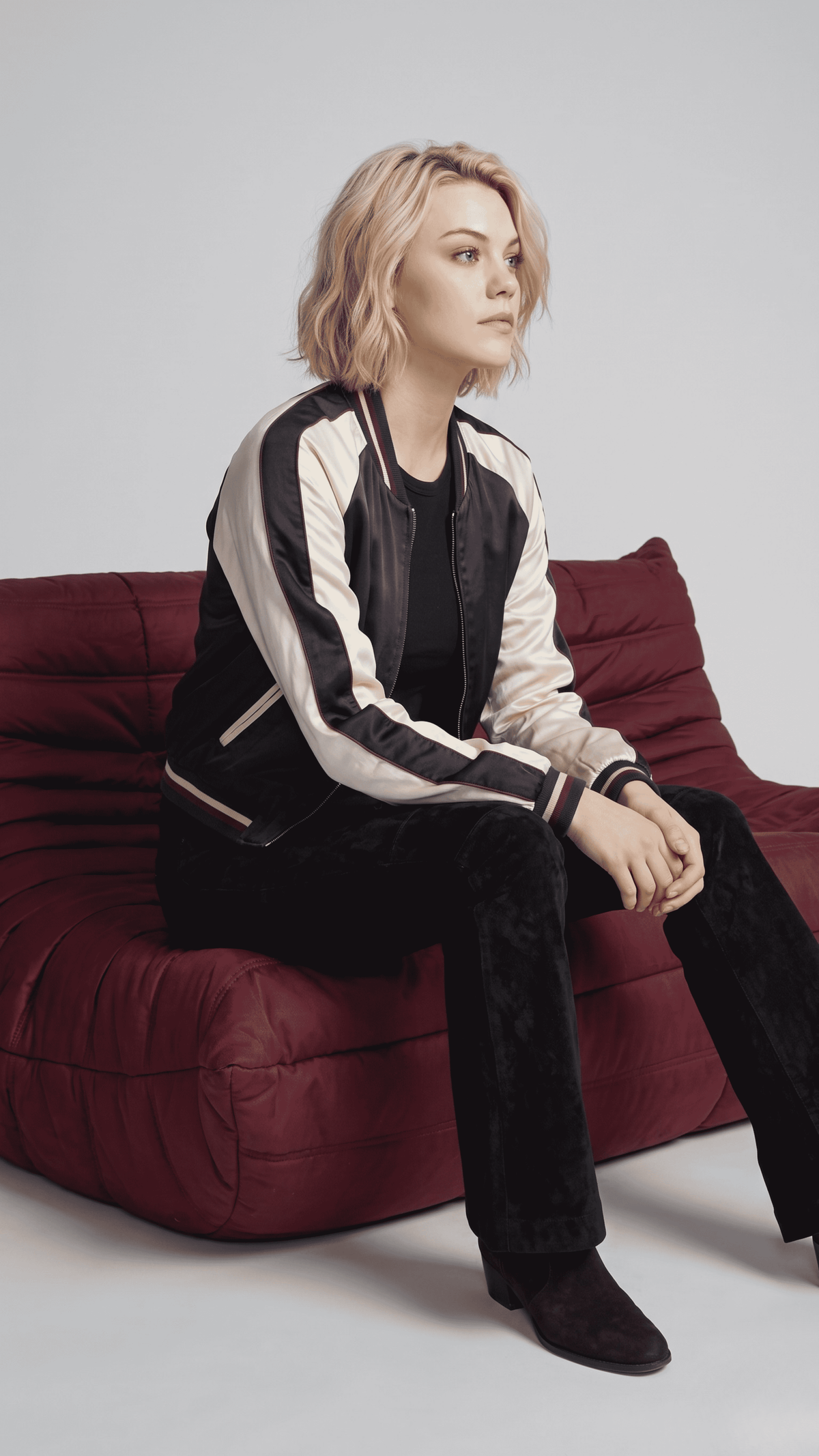 Women's smart-casual fashion featuring a lightweight dark navy blue striped jacket styled for a modern clean look.