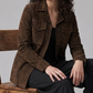 Tailored dark brown suede utility jacket with structured pointed collar and dark buttons.