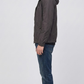 Regular fit men's charcoal grey silk cotton coat displaying functional side pockets and a comfortable, streamlined silhouette.