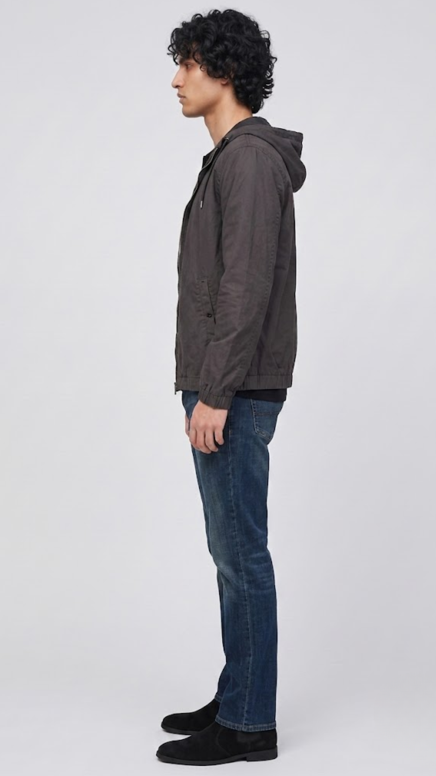 Regular fit men's charcoal grey silk cotton coat displaying functional side pockets and a comfortable, streamlined silhouette.