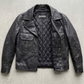 the fine craftsmanship, durable stitching, and high-quality leather texture on a black Jackero jacket.