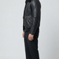 Jackero jacket functional side pockets, and premium hardware of a black leather bomber coat.