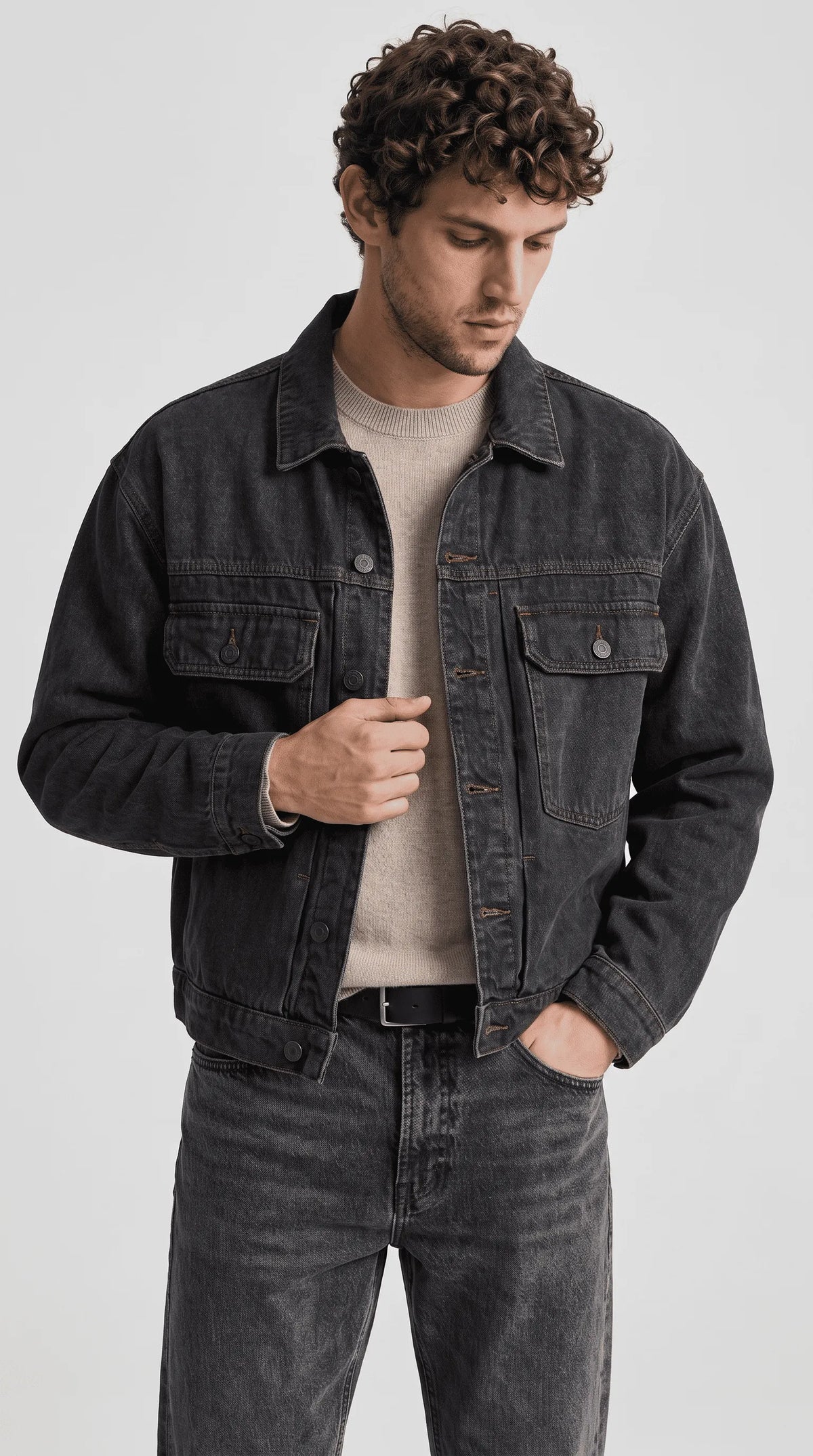 Capture the essence of urban grunge with the Jackero faded charcoal washed denim jacket, an engaging streetwear essential designed for a bold and lived-in aesthetic.
