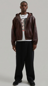 Premium dark maroon leather bomber jacket with an adjustable drawstring hood, featuring front zip closure and ribbed cuffs by Jackero.
