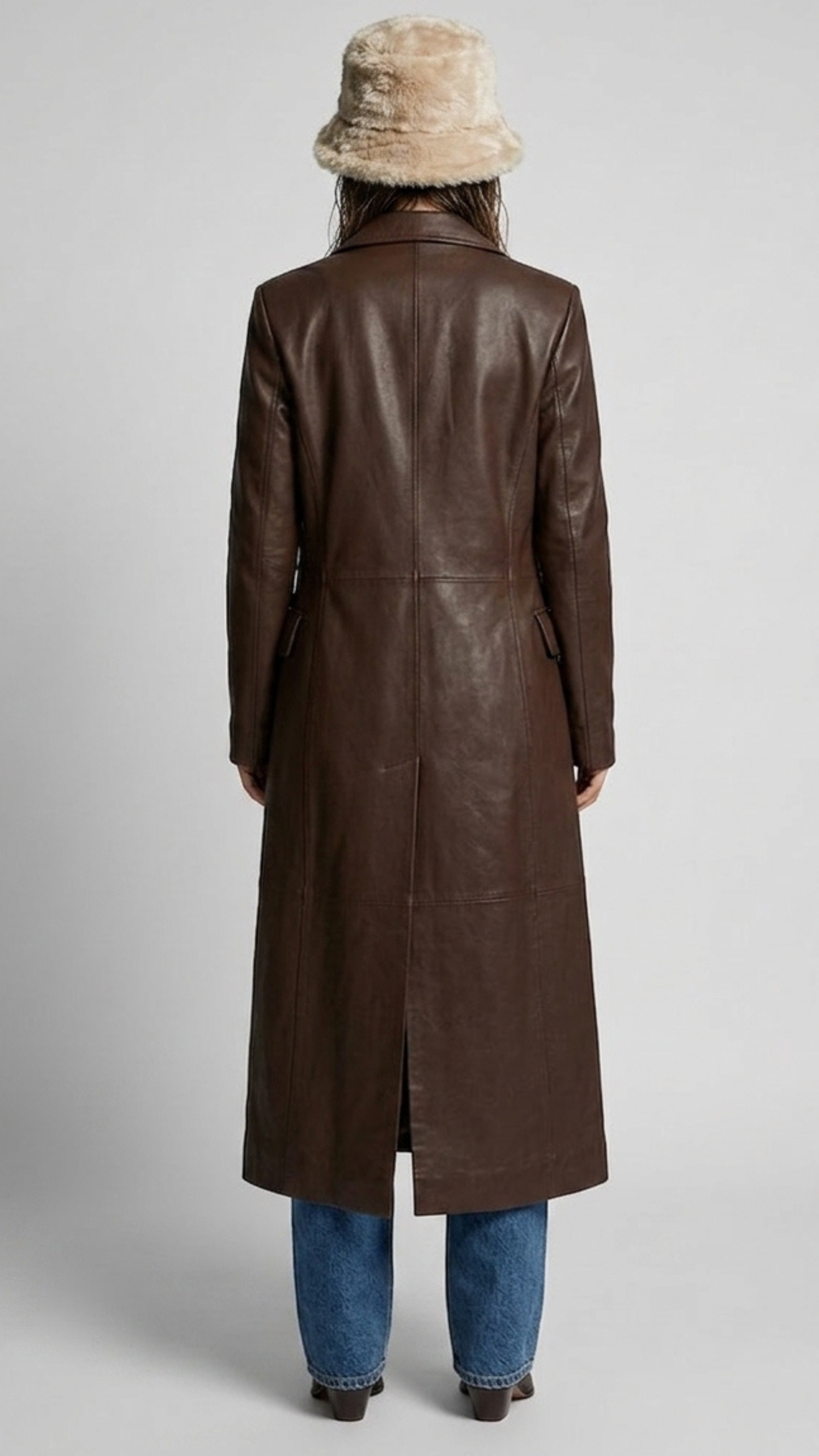 Back view showing the classic long-cut design of a dark brown genuine leather trench coat.