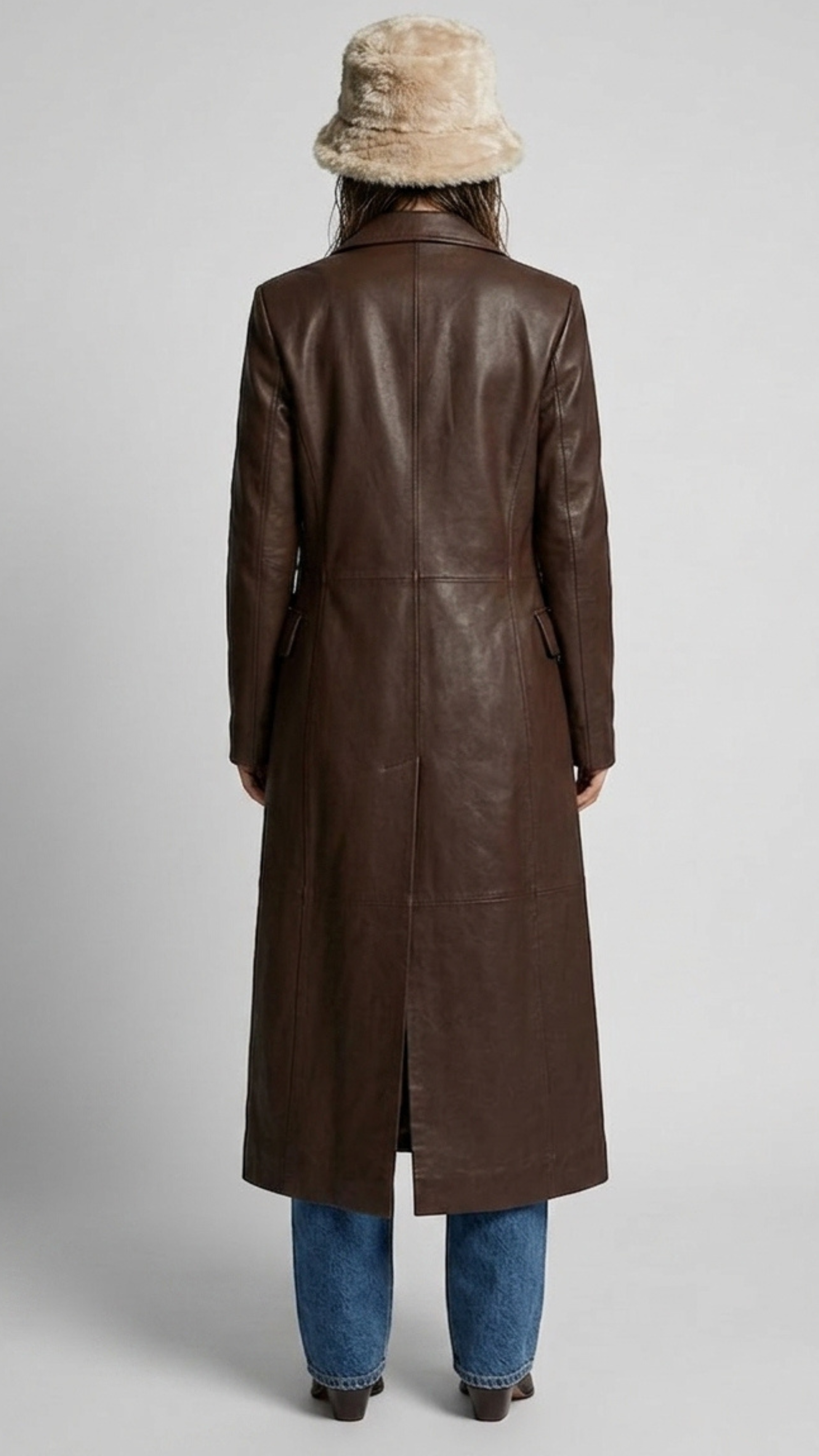 Back view showing the classic long-cut design of a dark brown genuine leather trench coat.