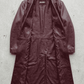 Flat lay view of Jackero dark red vine long leather coat displaying soft inner lining and interior welt pocket