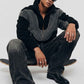 Model wearing baggy Y2K black and dark grey wool fleece jacket with relaxed streetwear layering profile.