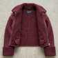 Professional product flat lay image of a premium burgundy suede shearling flight jacket meticulously displayed for a clean commercial e-commerce presentation.