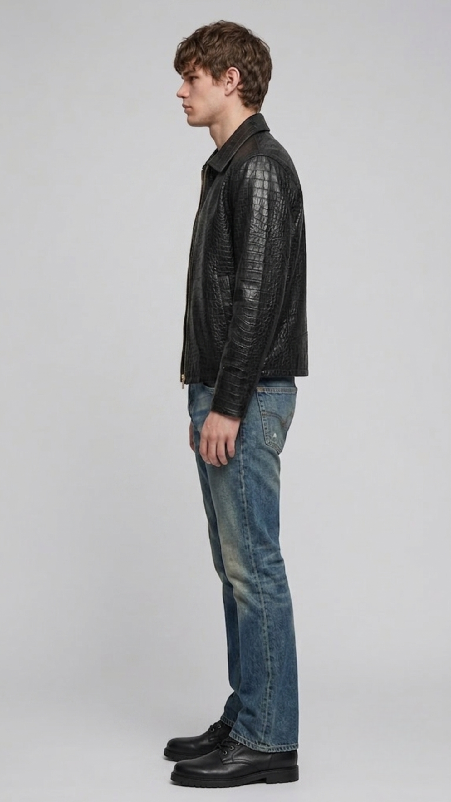 Jackero black crocodile texture leather jacket highlighting the clean shoulder fit.