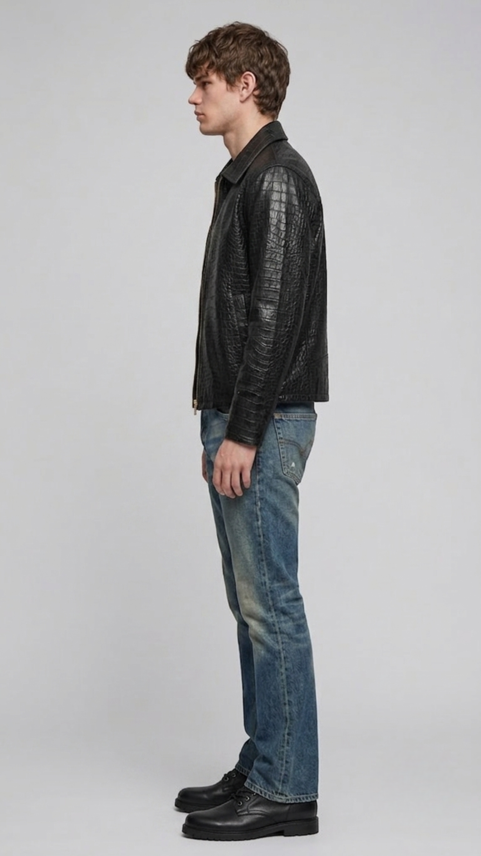 Jackero black crocodile texture leather jacket highlighting the clean shoulder fit.