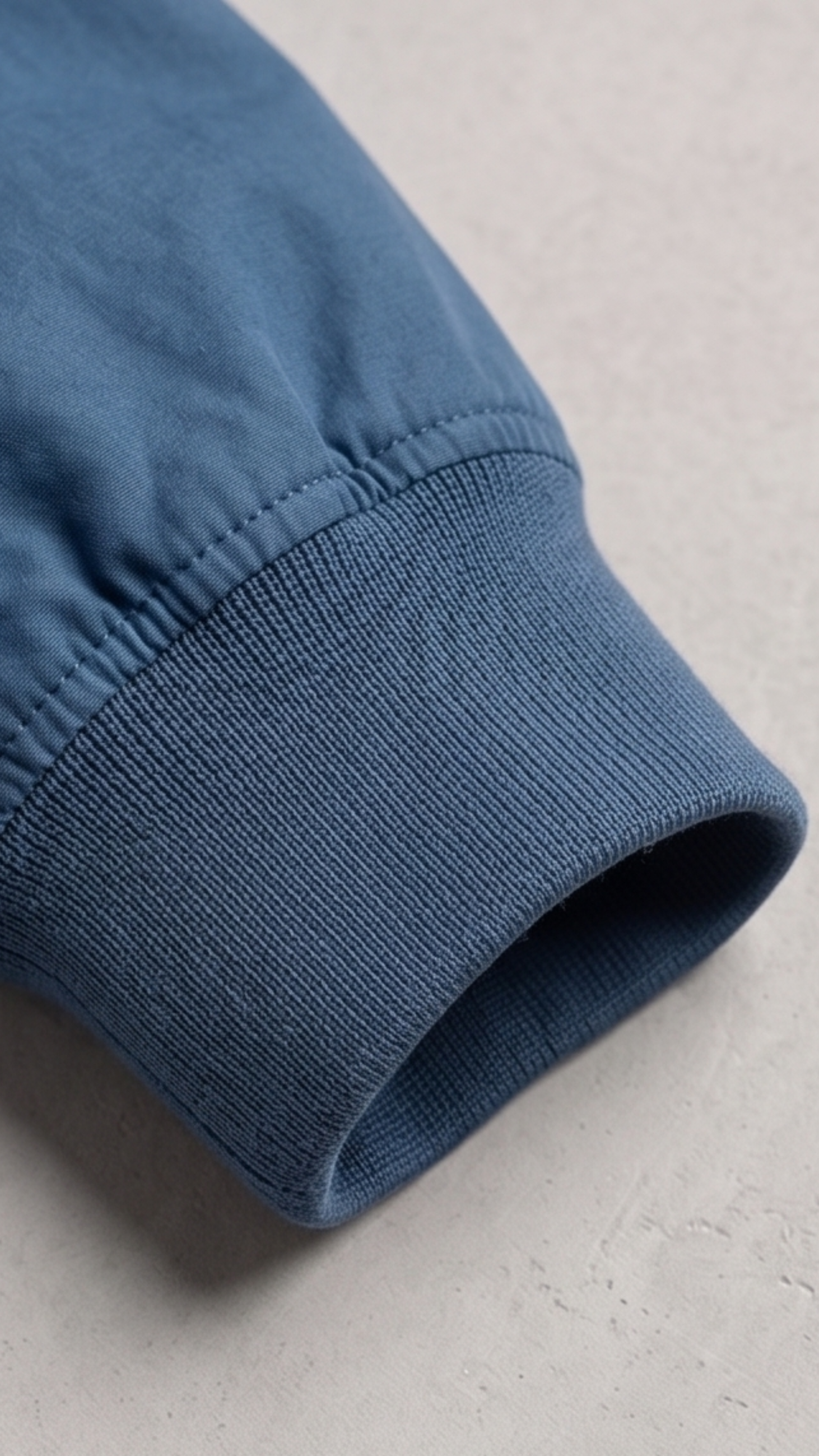 Close-up shot showcasing the subtle luxury sheen of the high-quality cyan silk cotton blend fabric and precise stitching lines.