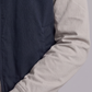 Close-up shot showing the high-quality stitching and texture contrast between the dark navy blue and grey cotton fabric panels.