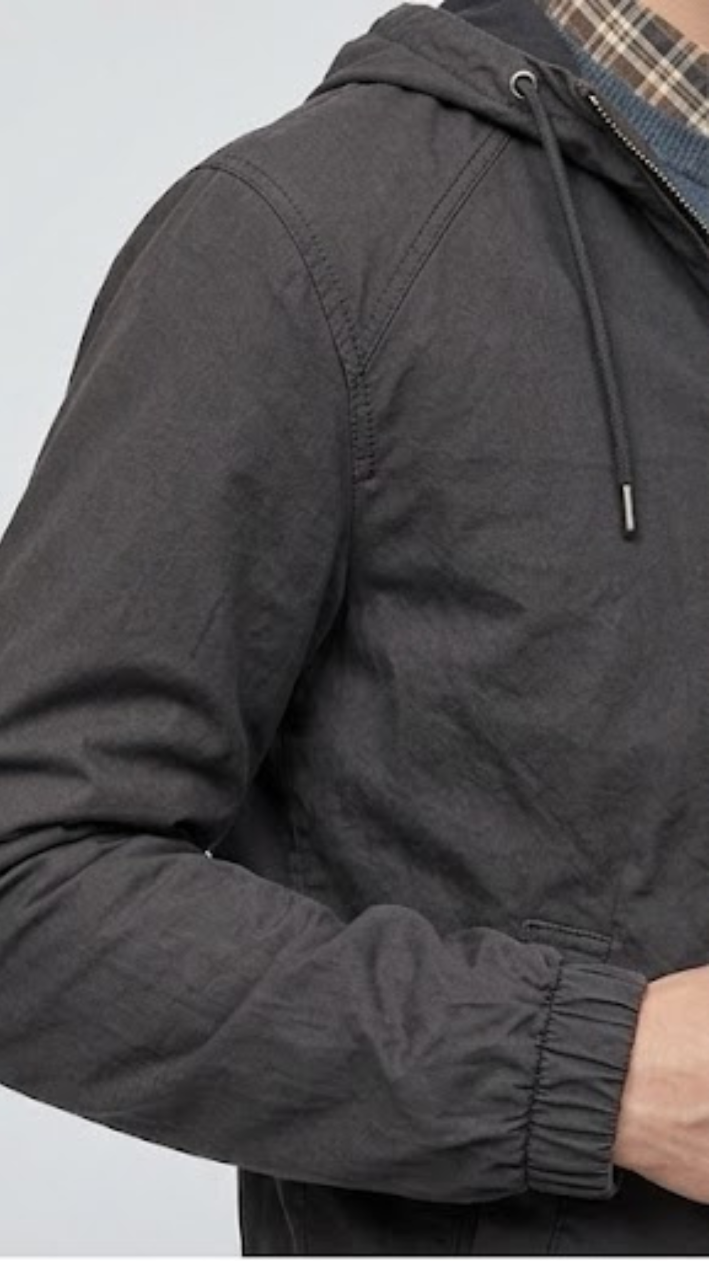Close-up shot highlighting the soft matte texture of a high-quality charcoal grey silk cotton blend fabric and neat seams.