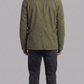 Regular fit olive utility outerwear layered perfectly over a casual sweater for a clean urban streetwear aesthetic.