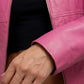 Detailed view of the structured collar lapels, durable metallic zippers, and neat stitching on a rose pink leather coat.