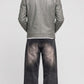 Men's contemporary urban streetwear fashion featuring a JACKERO tailored grey leather jacket styled for an upscale casual look.