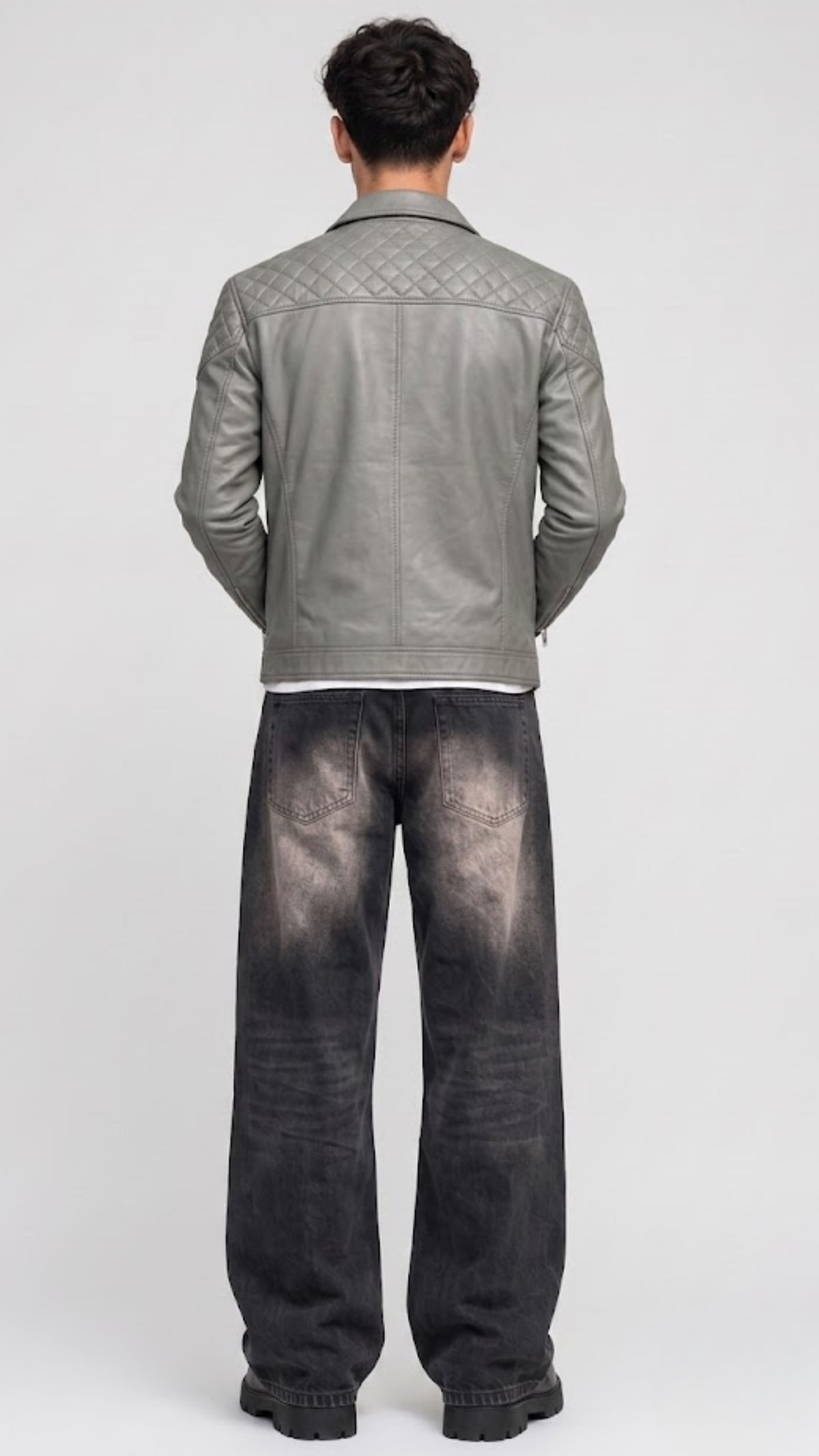 Men's contemporary urban streetwear fashion featuring a JACKERO tailored grey leather jacket styled for an upscale casual look.