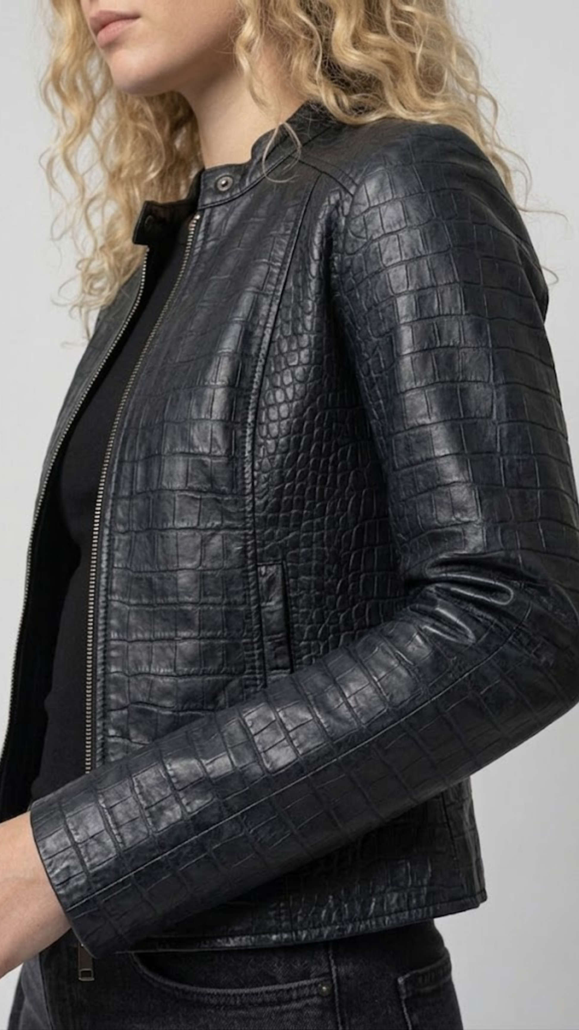 Close-up shot highlighting the high-definition exotic reptile scale pattern and premium glossy finish of the women's black croc leather material.