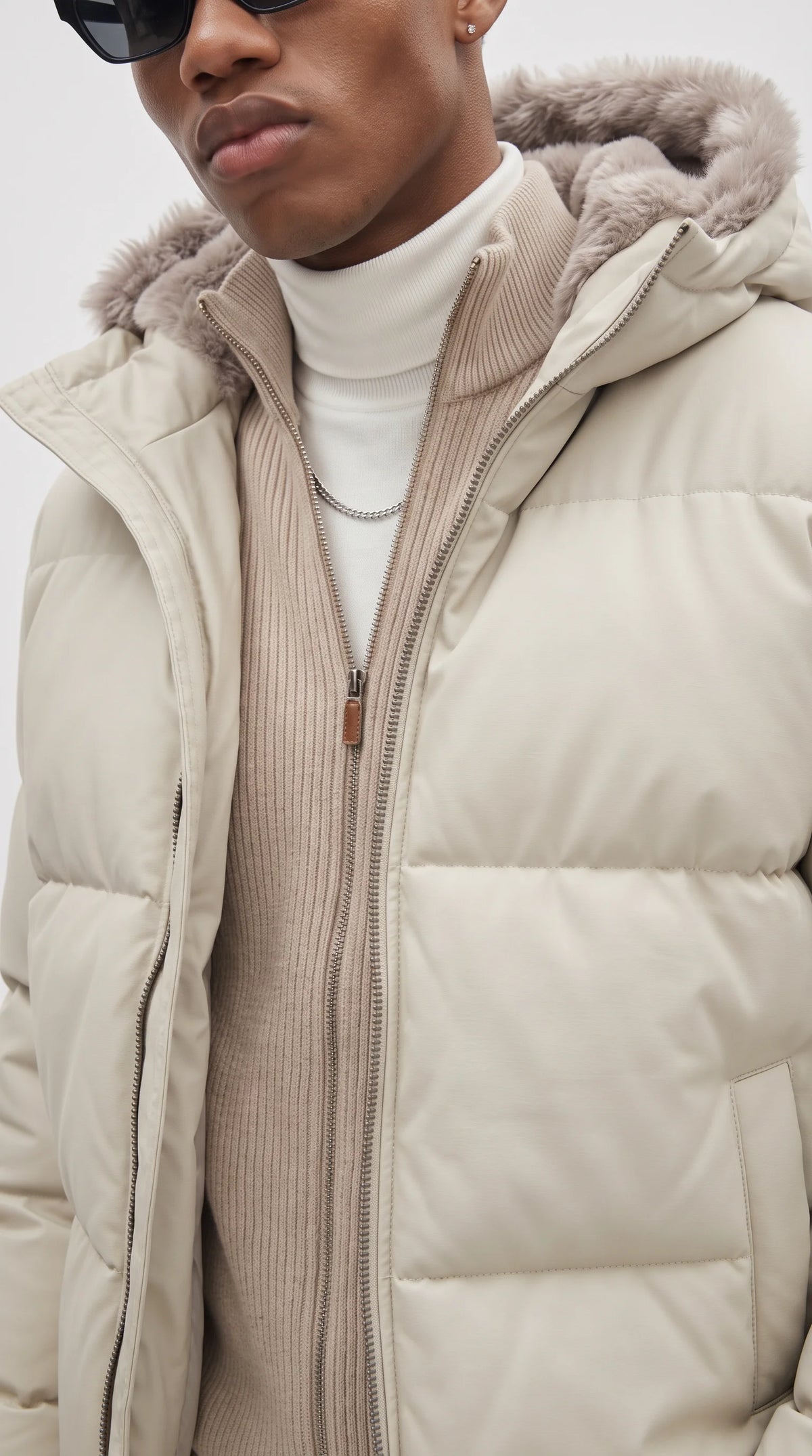 A standout Jackero arctic white bubble coat designed for the bold urban trendsetter, combining maximum frost-ready insulation with a plush statement fur hood.