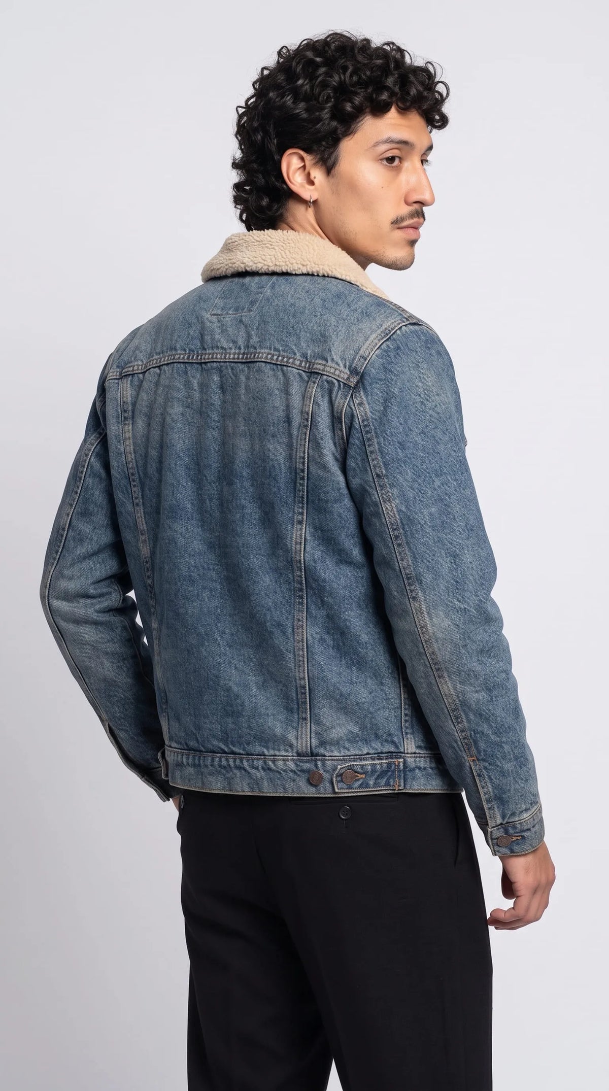 Stay cozy and effortlessly stylish in this Jackero classic blue denim outerwear, beautifully accented with soft shearling details to elevate your everyday winter wardrobe into an engaging urban masterpiece.