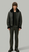Dark black leather jacket by jackero with a plush white shearling collar shown from the front view.