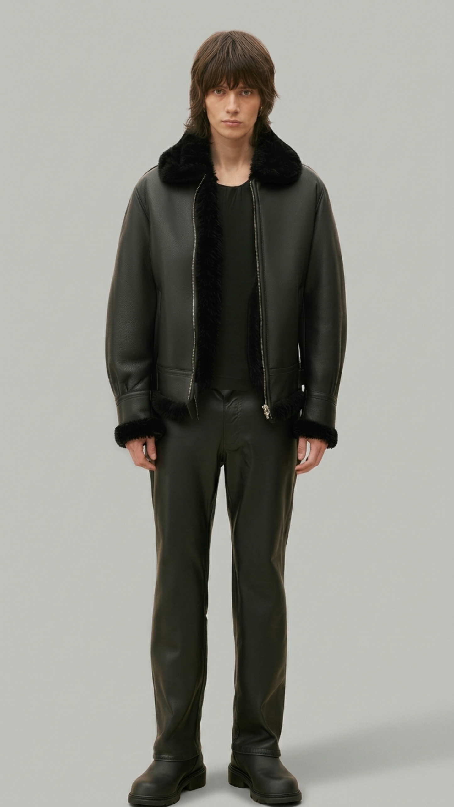 Dark black leather jacket by jackero with a plush white shearling collar shown from the front view.