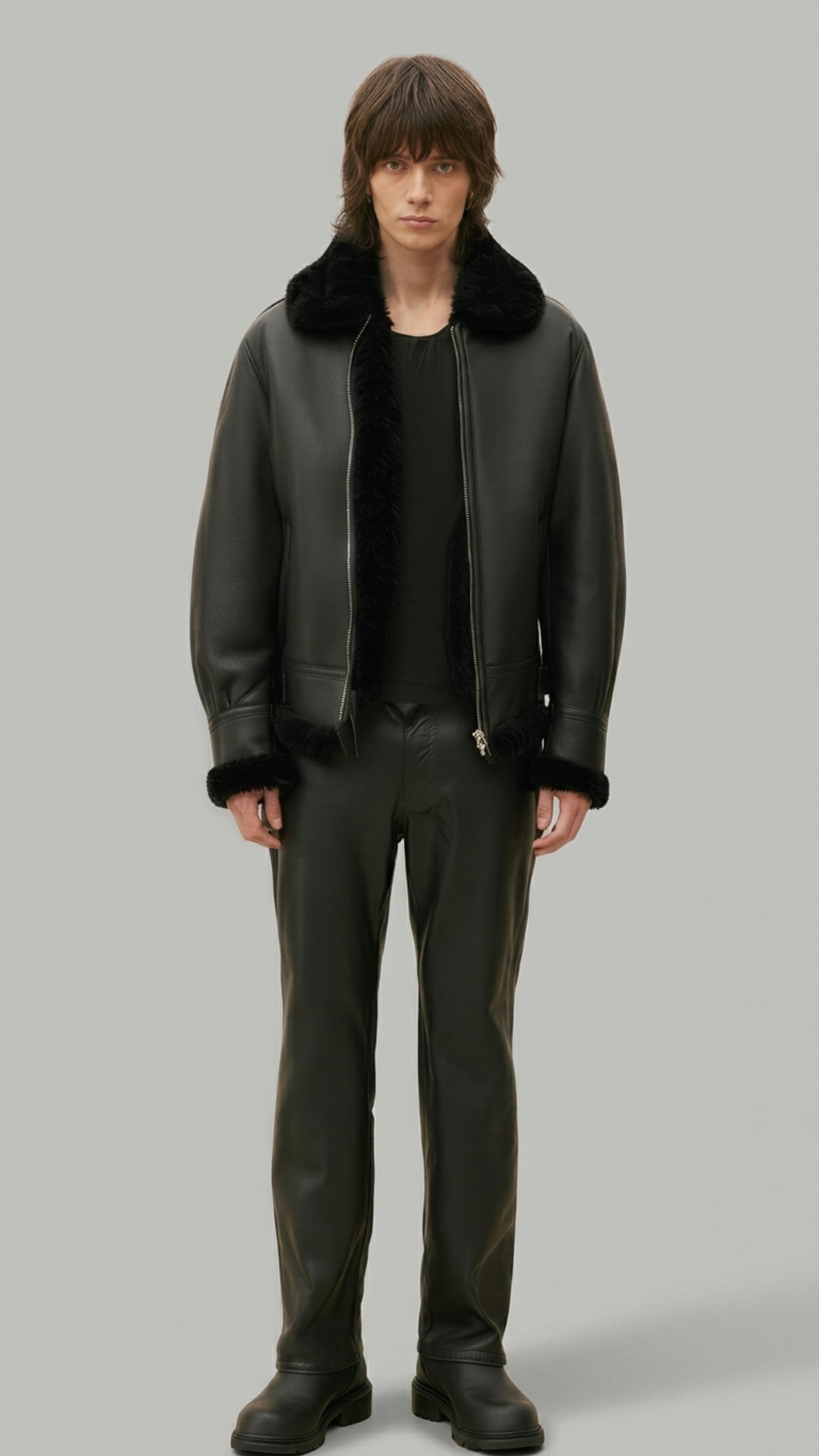 Dark black leather jacket by jackero with a plush white shearling collar shown from the front view.