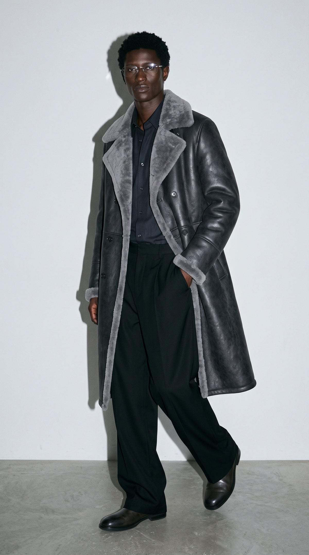 Dominate the chilly urban landscape with the Jackero dark grey long leather coat, showcasing a plush faux shearling trim that effortlessly defines high-end engaging streetwear.