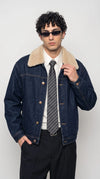 Stay warm and incredibly stylish this winter with the Jackero dark indigo denim jacket, featuring a soft plush shearling collar that adds an engaging streetwear edge to your cold-weather wardrobe.