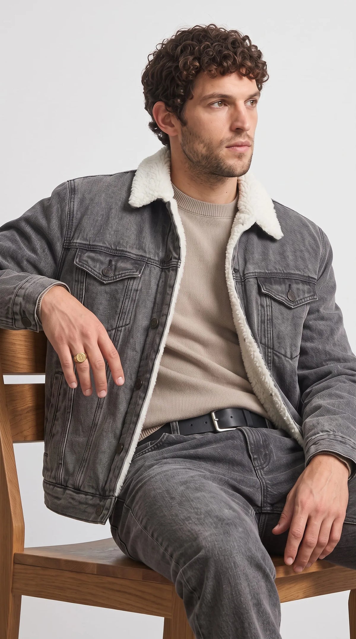 In this Jackero smokey grey jean apparel, boasting a luxurious faux shearling trim that transforms a classic vintage silhouette into a highly engaging streetwear masterpiece.
