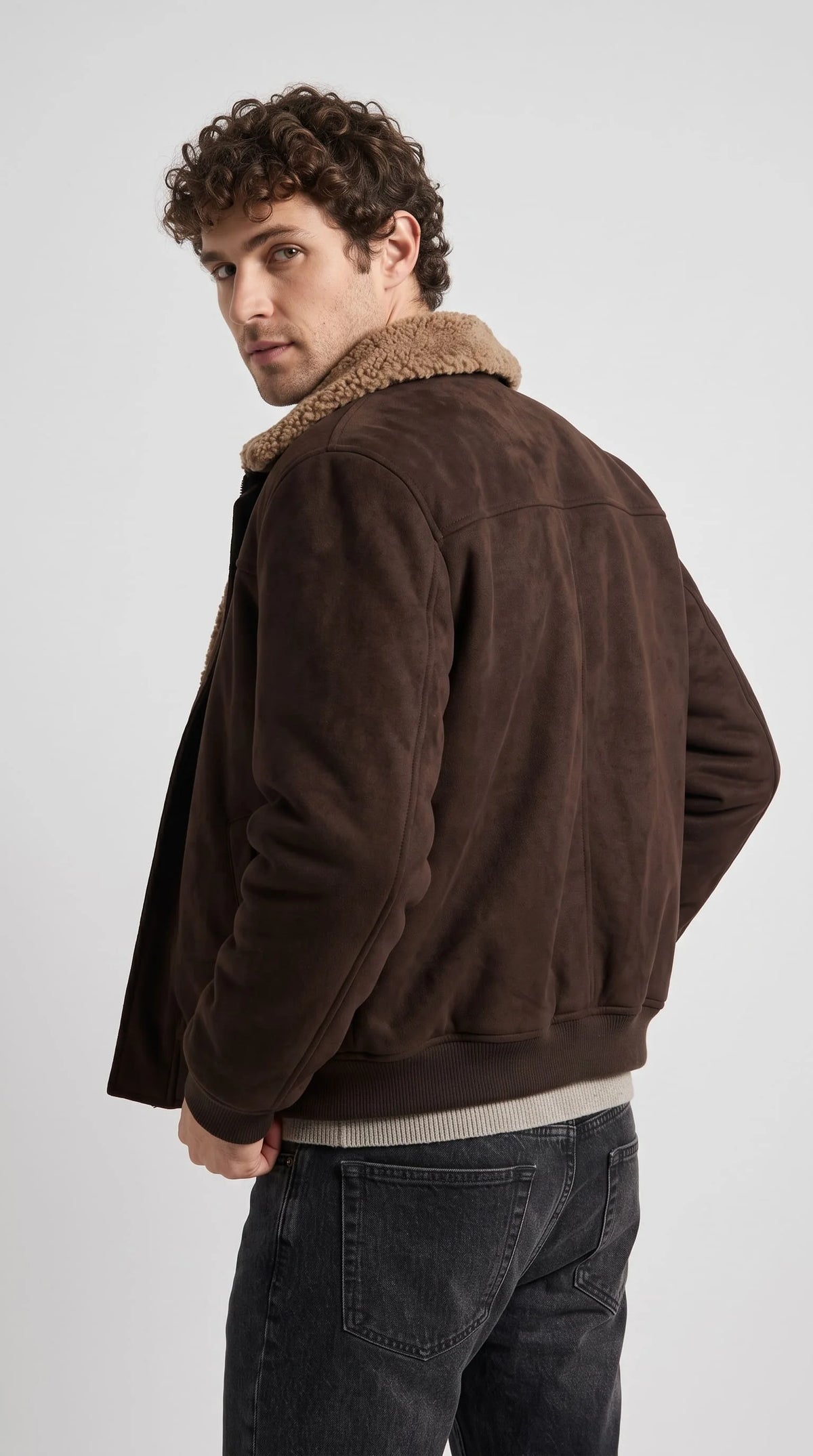 Step up your layering game in the Jackero heavy-duty dark brown suede outerwear, expertly crafted with rich brown fleece to bring a sophisticated yet edgy urban feel to your daily everyday fits.