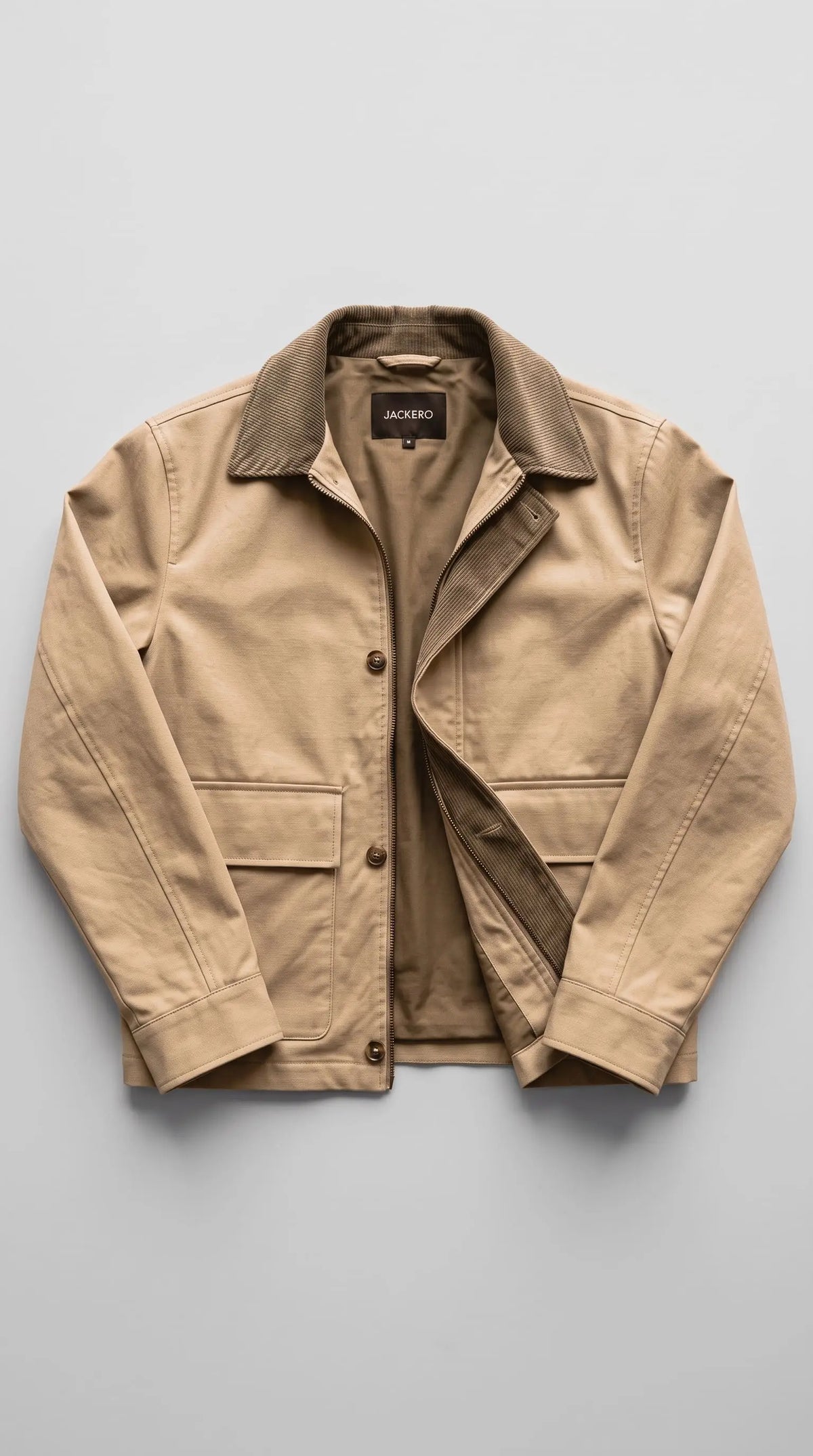 Beige jacket with brown collar and interior on a gray background