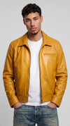 Make your streetwear wardrobe pop with the vibrant Jackero mustard yellow leather jacket, featuring a bold and engaging aesthetic designed for trendsetters who love standout fashion.