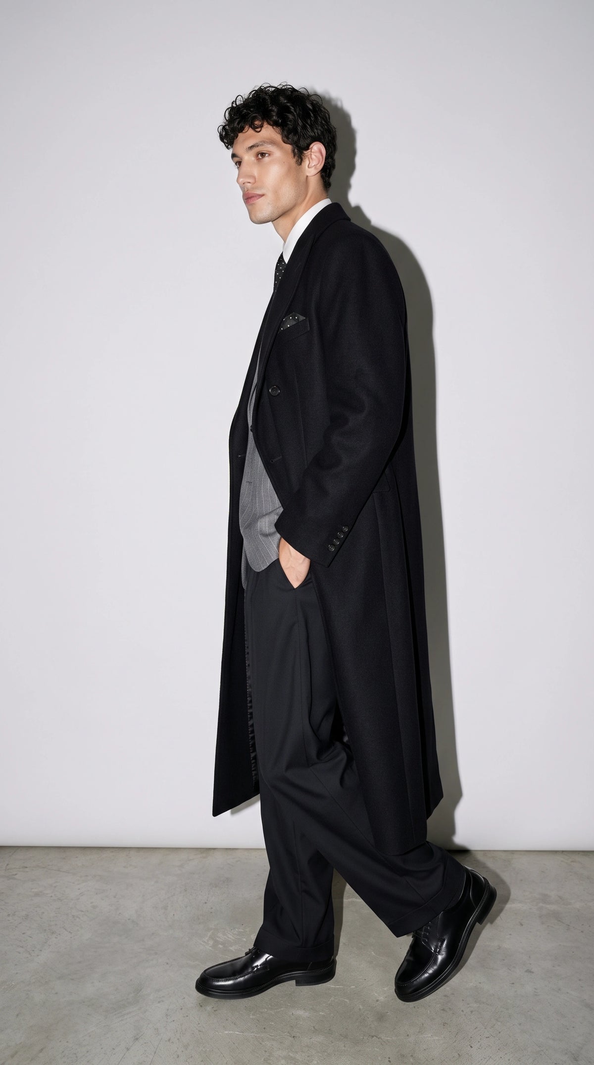 Upgrade your winter layering game with this Jackero premium black double-breasted trench coat, featuring a dramatic longline silhouette that adds a highly engaging streetwear vibe to any outfit.