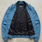 Jackero contemporary cyan silk cotton blend bomber jacket beautifully presented against a clean, minimalist studio backdrop.