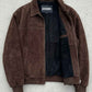 Jackero contemporary dark chocolate brown baggy oversize suede jacket beautifully presented against a clean, minimalist studio backdrop.