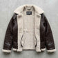 Jackero contemporary dark chocolate brown leather baggy oversized jacket with shearling presented against a clean, minimalist studio backdrop.