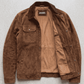 Jackero dark chocolate brown suede jacket beautifully presented against a clean, minimalist studio backdrop.