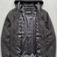 Jackero contemporary dark grey silk cotton hooded outerwear beautifully presented against a clean, minimalist studio backdrop.