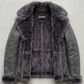 Jackero contemporary dark grey suede jacket with dark grey faux shearling beautifully presented against a clean, minimalist studio backdrop.