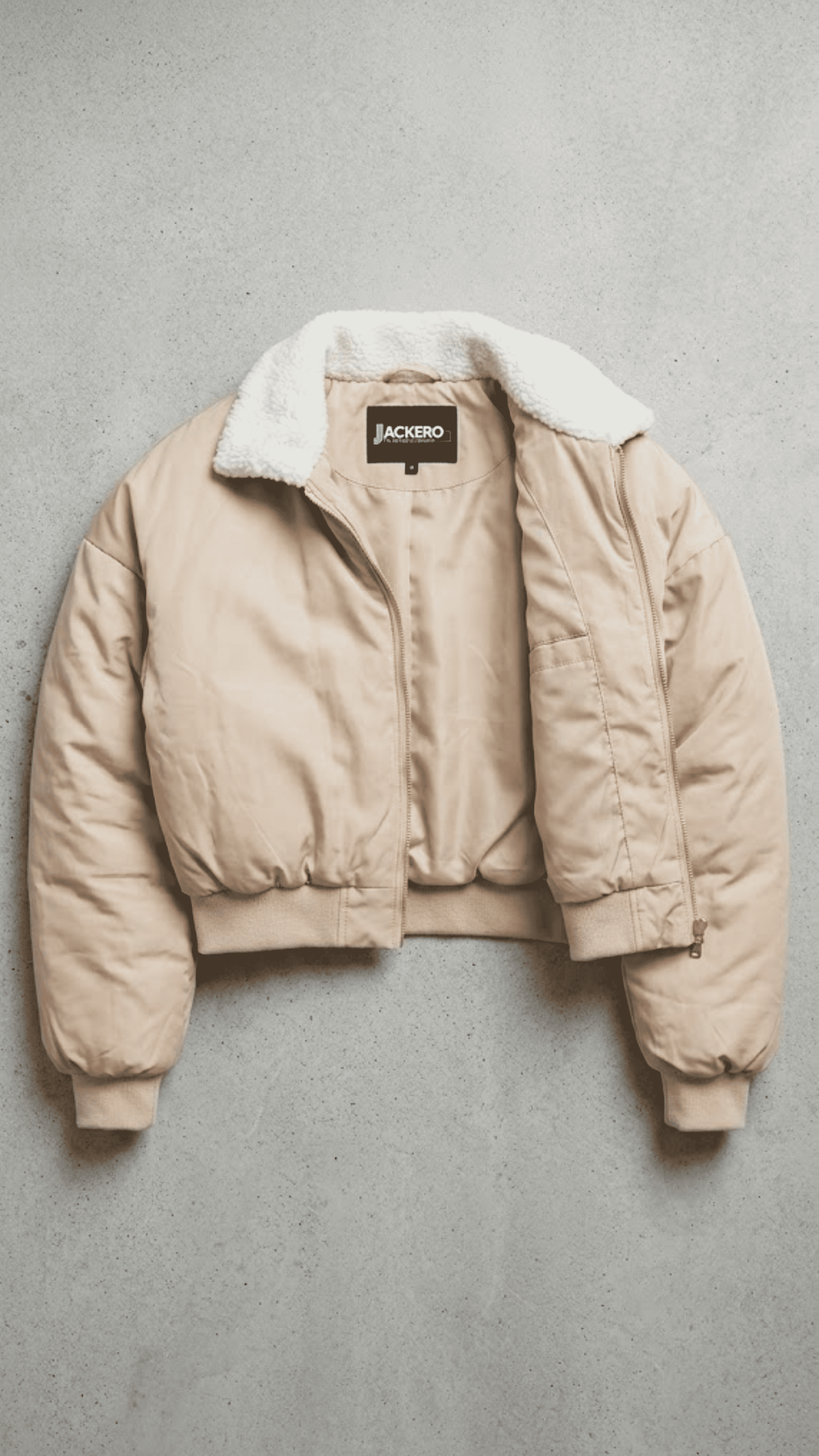 Jackero contemporary light beige silk cotton blend cropped jacket beautifully presented against a clean, minimalist studio backdrop.