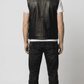 Regular fit men's black leather gilet displaying clean lines, functional front pockets, and a comfortable tailored alignment.